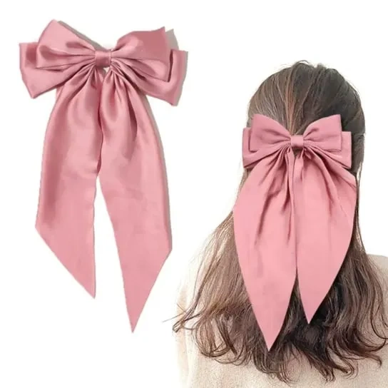 Ozdobna kokarda do włosów na spince różowa
