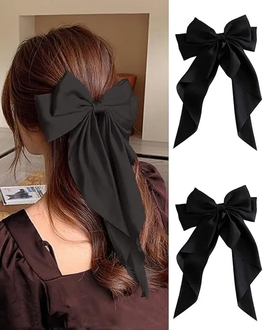 Ozdobna kokarda do włosów na spince czarna
